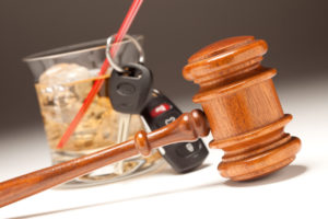 Gavel, Alcoholic Drink and Car Keys showing DUI affect on life insurance